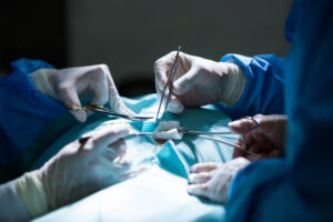 Surgeons performing operation in operation room at the hospital